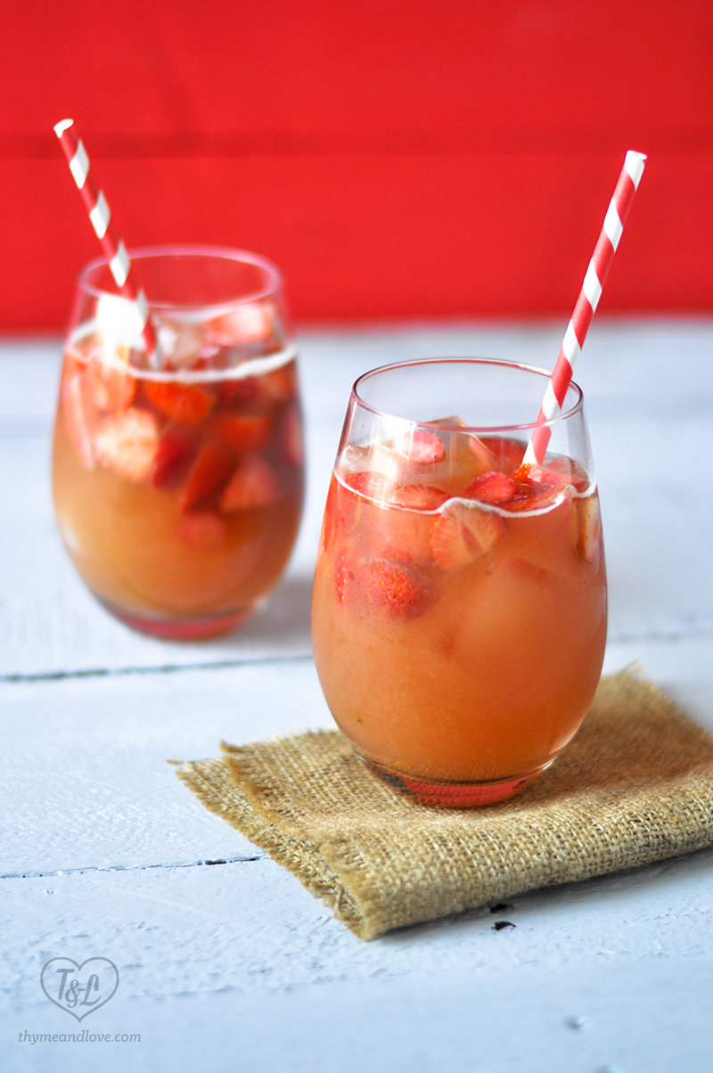 Kick off your weekend with the perfect drink for Summer: Strawberry Rhubarb Sangria! #rhubarb #sangria #memorialday #summer #drink 