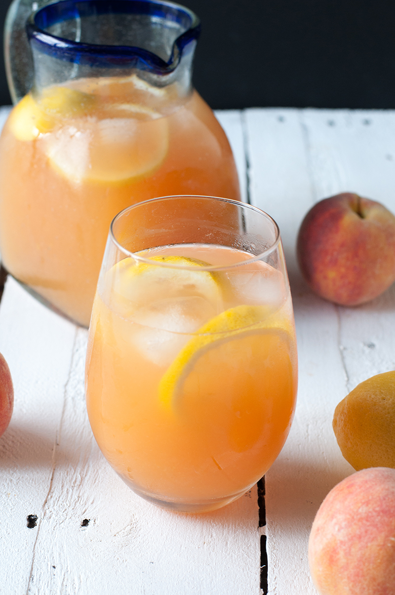 Enjoy a glass of refreshing Ginger Peach Lemonade on a hot, summer day. #drink #summer