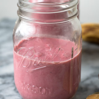 Ultra creamy Strawberry Peanut Butter Smoothie. Protein packed from the peanut butter and creamy from frozen strawberries and banana.