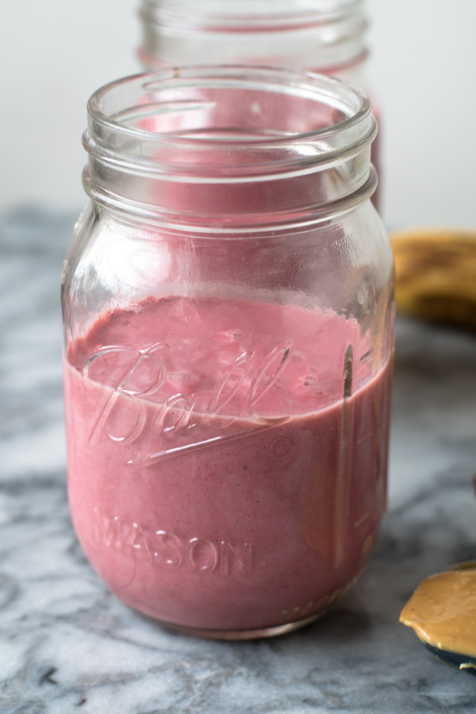 Ultra creamy Strawberry Peanut Butter Smoothie. Protein packed from the peanut butter and creamy from frozen strawberries and banana. 