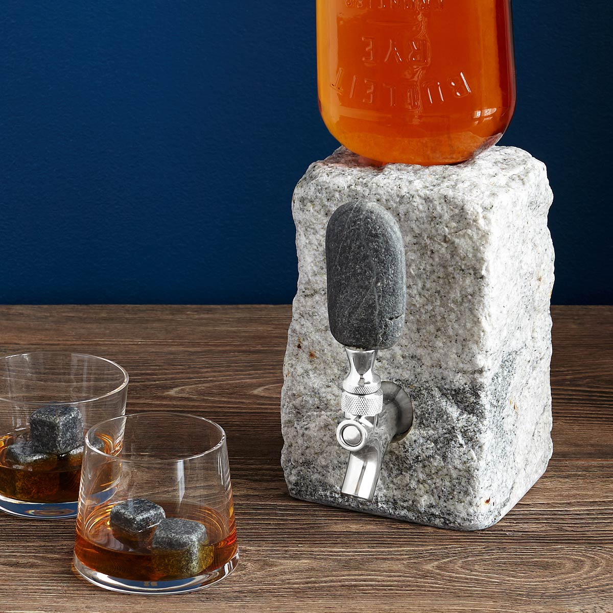 Stone Drink Dispenser Tap your favorite spirits in geologic style with Jeff Henderson's cobbled granite drink dispenser.