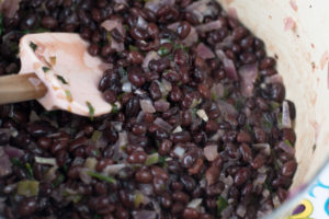 Black beans get a tropical twist. The beans are infused with coconut and fresh lime juice. An easy side dish and also great in burritos.