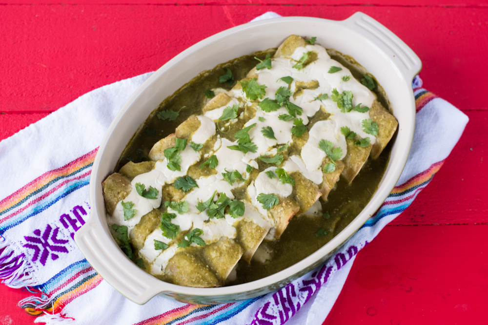 Vegan Potato and Roasted Poblano Enchiladas. Corn tortillas are filled with a potato & poblano peppers. #vegan #mexican 