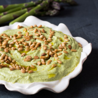 A spring inspired hummus recipe. Asparagus boosts the nutrition value of traditional hummus.