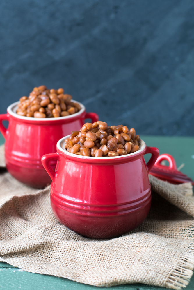 Slow Cooker Maple Baked Beans are an easy side dish to bring to your summer BBQs. 