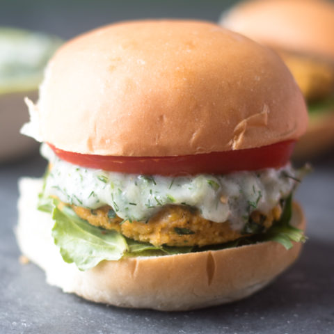 These Vegan Chickpea Burgers with Tzatziki Sauce are made with Middle Eastern spices and fresh herbs. They are quick and easy to make too!