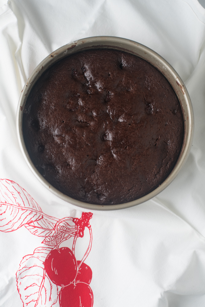 This chocolate cake is light, moist and airy. The perfect summertime cake. The secret to creating a light cake is beer!