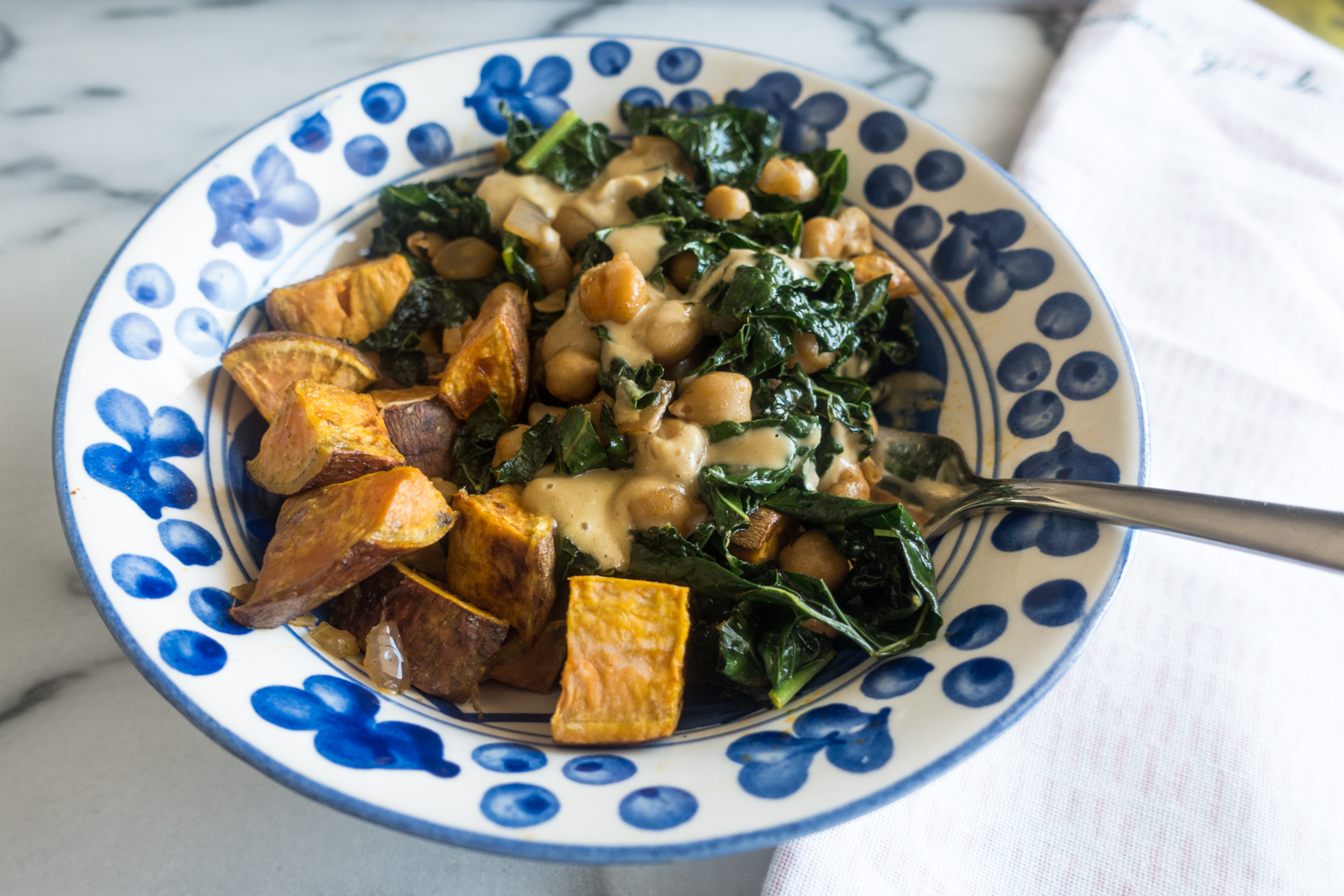Smoky Kale and Chickpeas with Miso Peanut Drizzle is a quick and delicious recipe from Bold Vegan by Celine Steen.