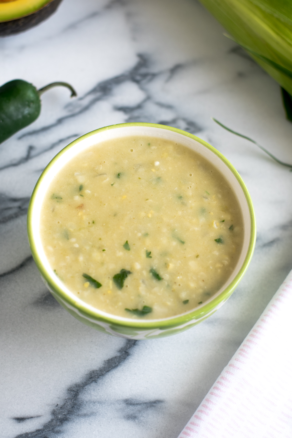 Spicy Corn and Potato Chowder gets a spicy kick from fresh jalapeno peppers!  Perfect way to use up the fresh summer corn! 