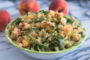 This Peach Quinoa Salad with Sriracha Vinaigrette is an easy salad recipe. It is a little sweet from the peaches and a little spicy from the Sriracha vinaigrette.