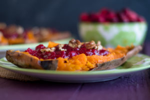 Cranberry Stuffed Sweet Potatoes combine two holiday side dishes in one!  #vegan #thanksgiving