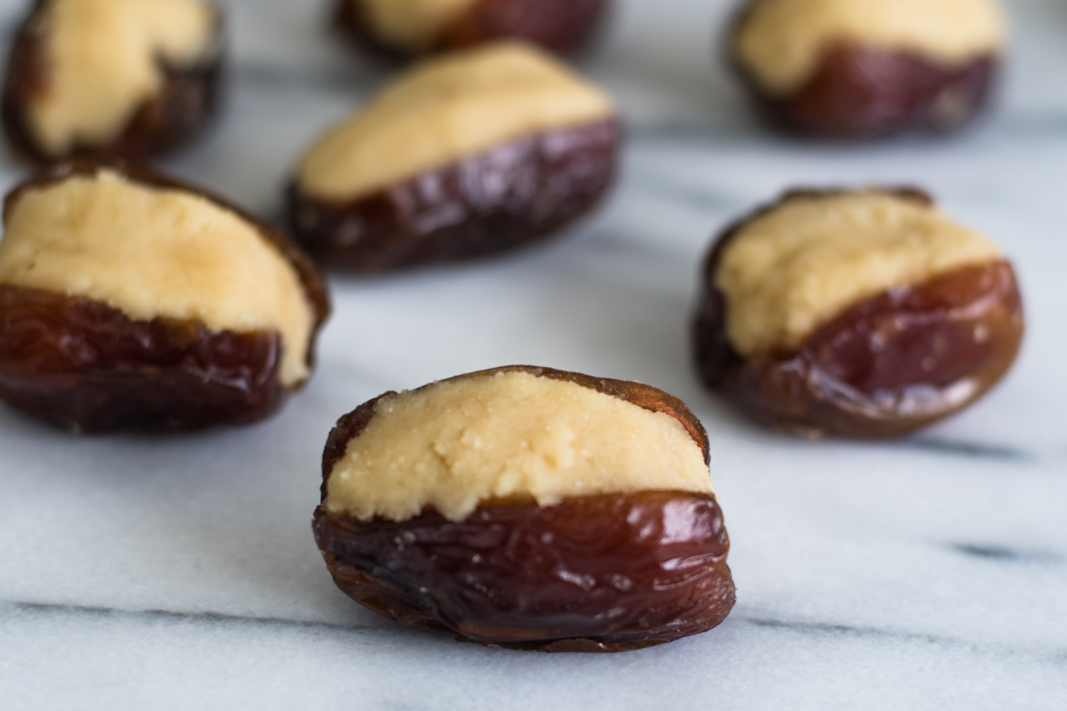 Inspired by a traditional Mexican sweet candy, these almond stuffed dates are made a little healthier with less sugar. #vegan #glutenfree #paleo