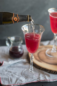 This Pomegranate Orange Prosecco Cocktail is light, refreshing and perfect for entertaining!