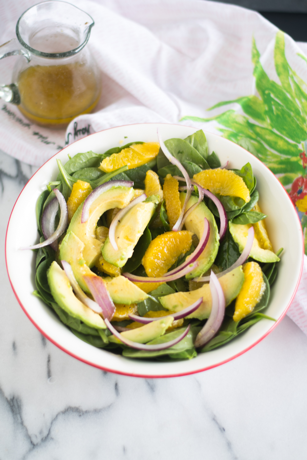 Start the new year off on a healthy note with this Spinach Orange and Avocado Salad with Guava Dressing! This salad is  light, refreshing and a perfect balance of flavors. 