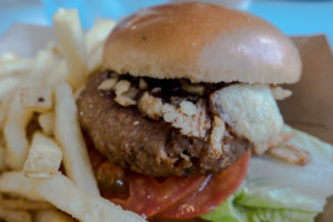Grilled Vegetarian Burger at Liberty Inn located at the America Pavilion in Epcot. #vegan #vegandisney