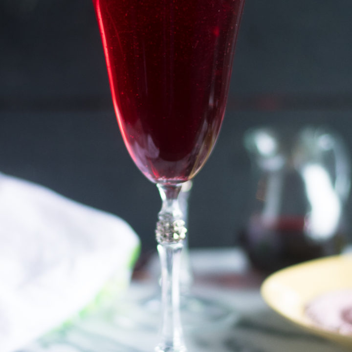 Slightly sweet and tart, these Hibiscus Mimosas are the perfect brunch cocktail.  #drink
