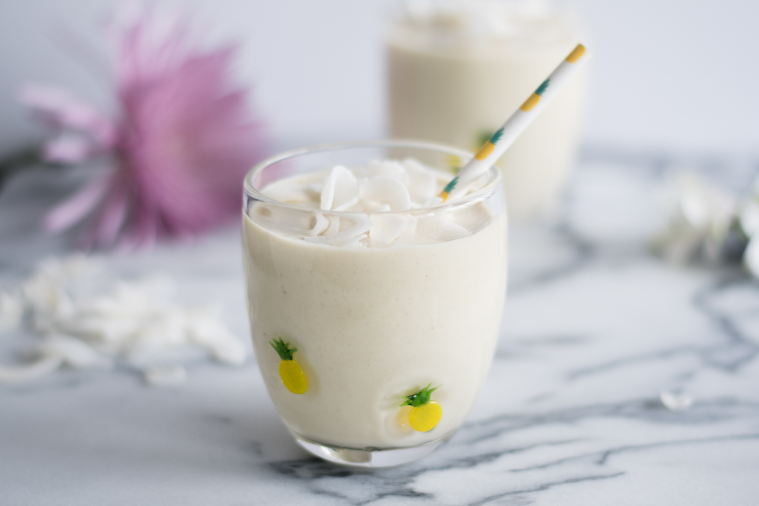 This Vegan Pina Colada Protein Smoothie will make you feel like you are on a tropical vacation.  #smoothie 