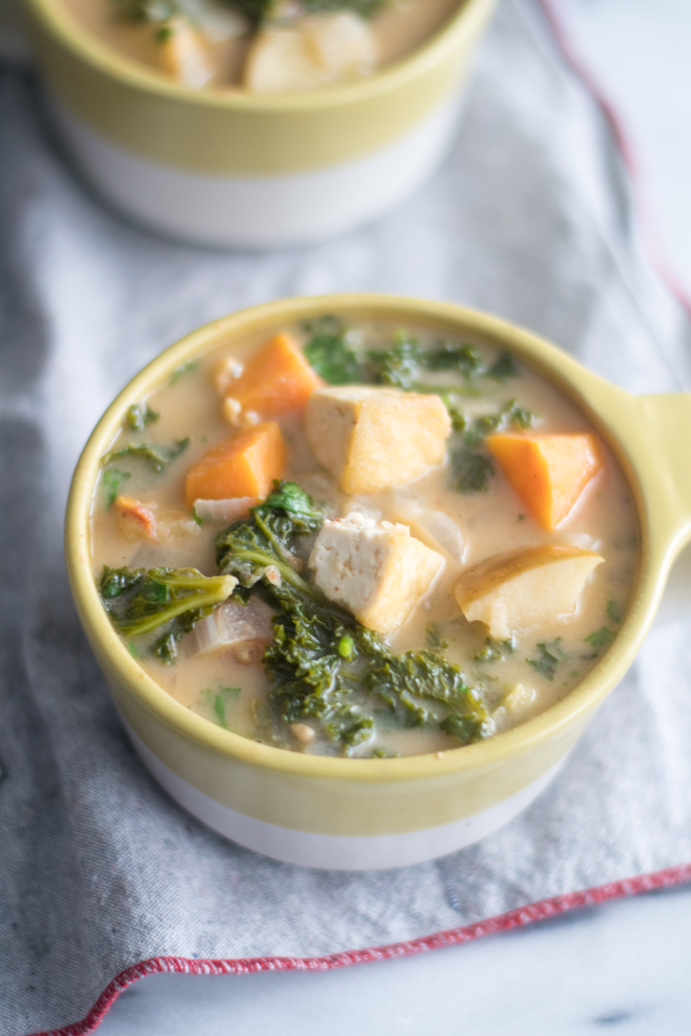 Tofu Apple and Almond Butter Stew with kale is a healthy and nutritious stew.  #vegan #glutenfree