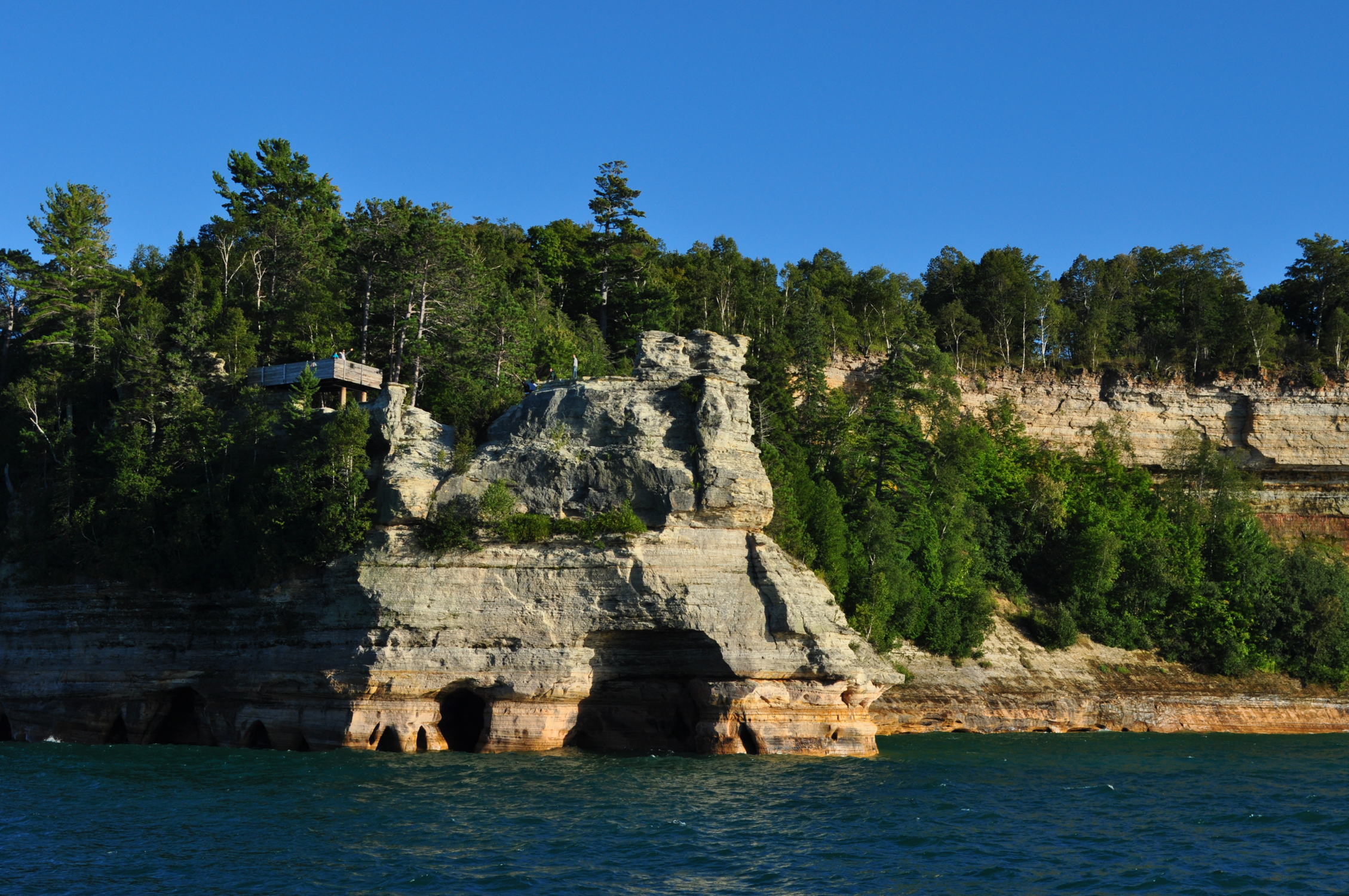 Pictured Rocks National Lakeshore is one of the most beautiful places in Michigan. Located in the Upper Peninsula, Pictured Rocks offers waterfalls, a gorgeous shoreline, miles of hiking trails, and beaches.