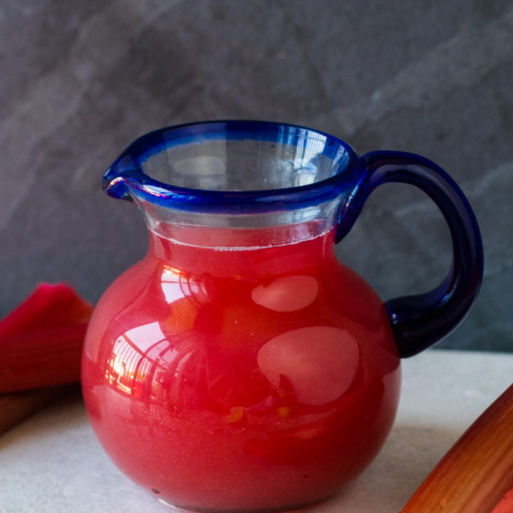 This Rhubarb Simple Syrup is so easy to make! It is perfect for summer drinks, lemonade and desserts! Plus, only 3 ingredients are required! #rhubarb #drinks #spring #summer #vegan #easyrecipes