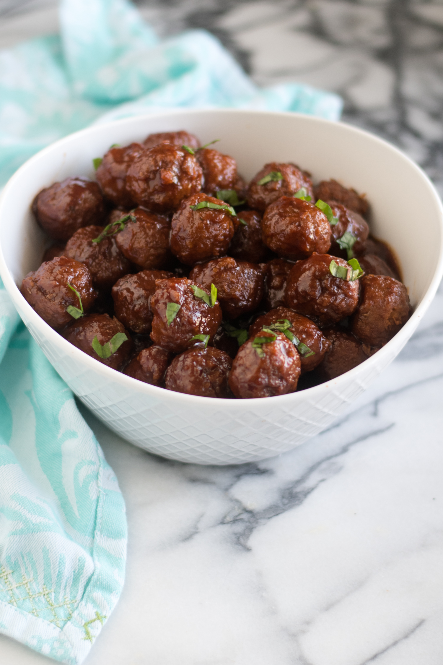 These  Slow Cooker Vegan Chili Sauce and Grape Jelly Meatballs would also be great served as a main course. For side dishes to serve with the meatballs, I love serving steamed rice or mashed potatoes. #vegan #holidays #Christmas #veganrecipes #vegetarian #slowcooker #crockpot 