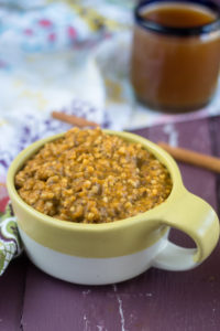 This Apple Cider Pumpkin Oatmeal is a fall inspired oatmeal recipe made right in the slow cooker! #breakfast #recipe #fall #pumpkin