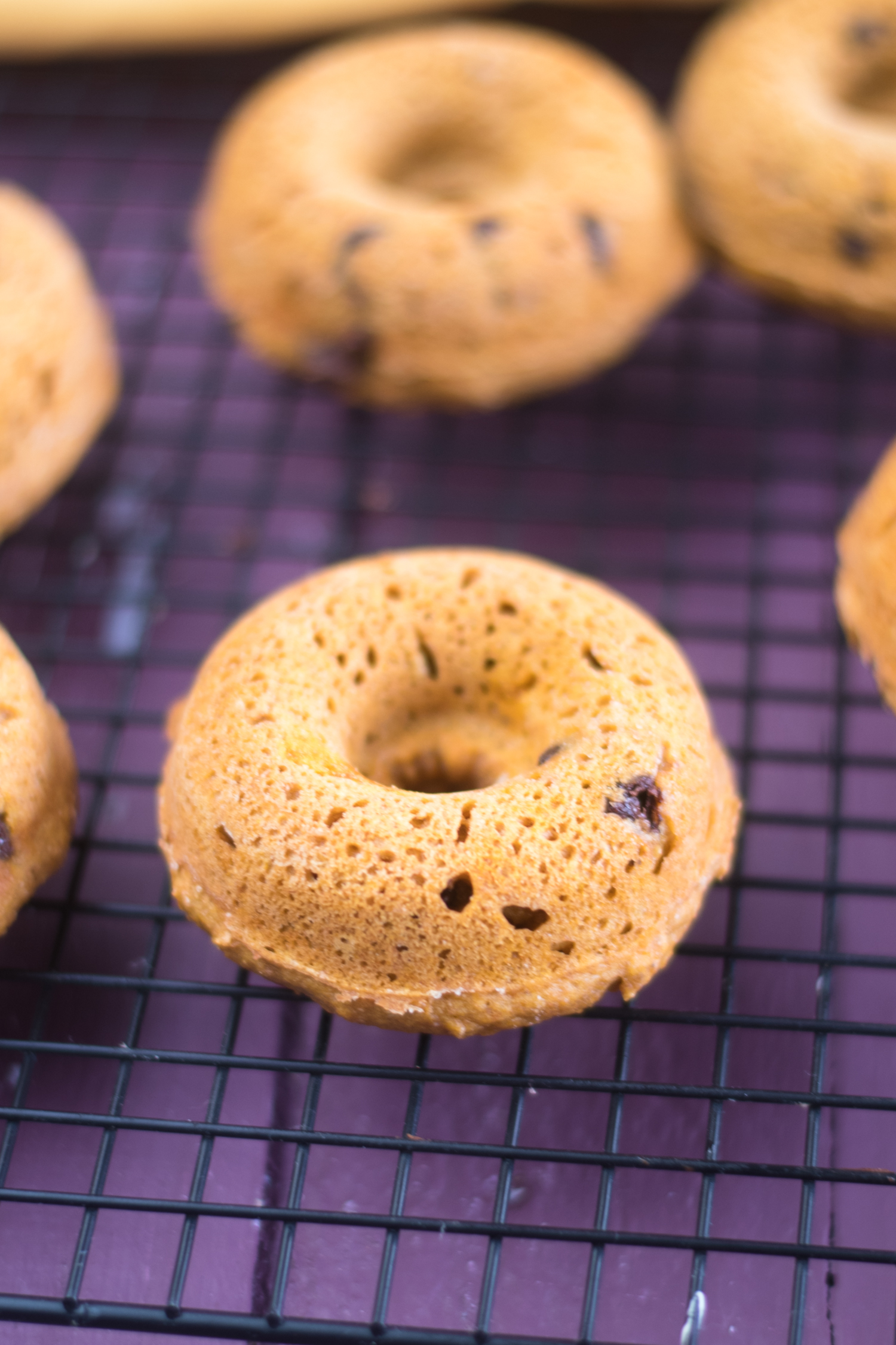 These Baked Pumpkin Spice Chocolate Chip Donuts are fluffy, light, and perfect for fall!