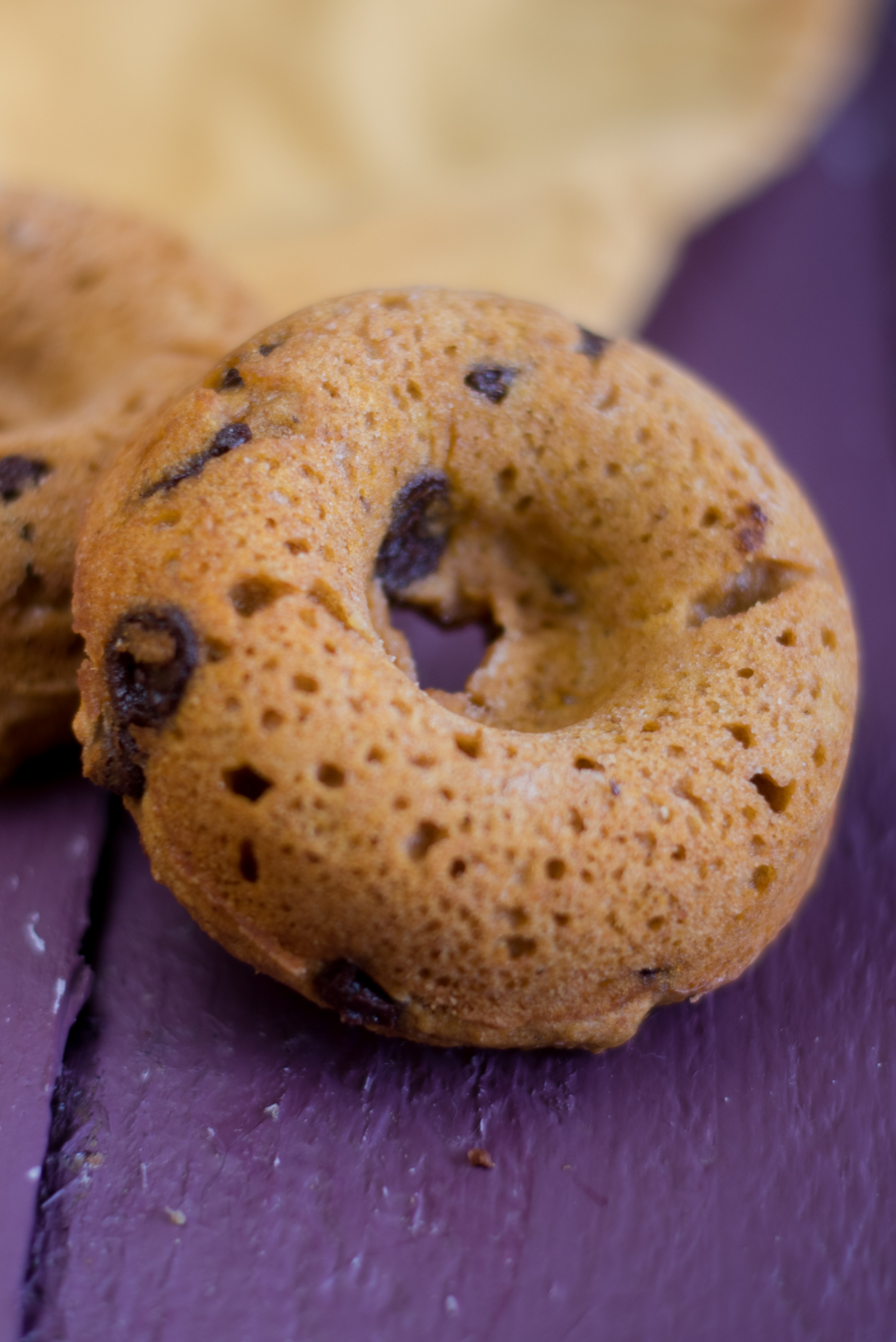 These Baked Pumpkin Spice Chocolate Chip Donuts are fluffy, light, and perfect for fall! #vegan #fall #recipes #breakfast #pumpkin