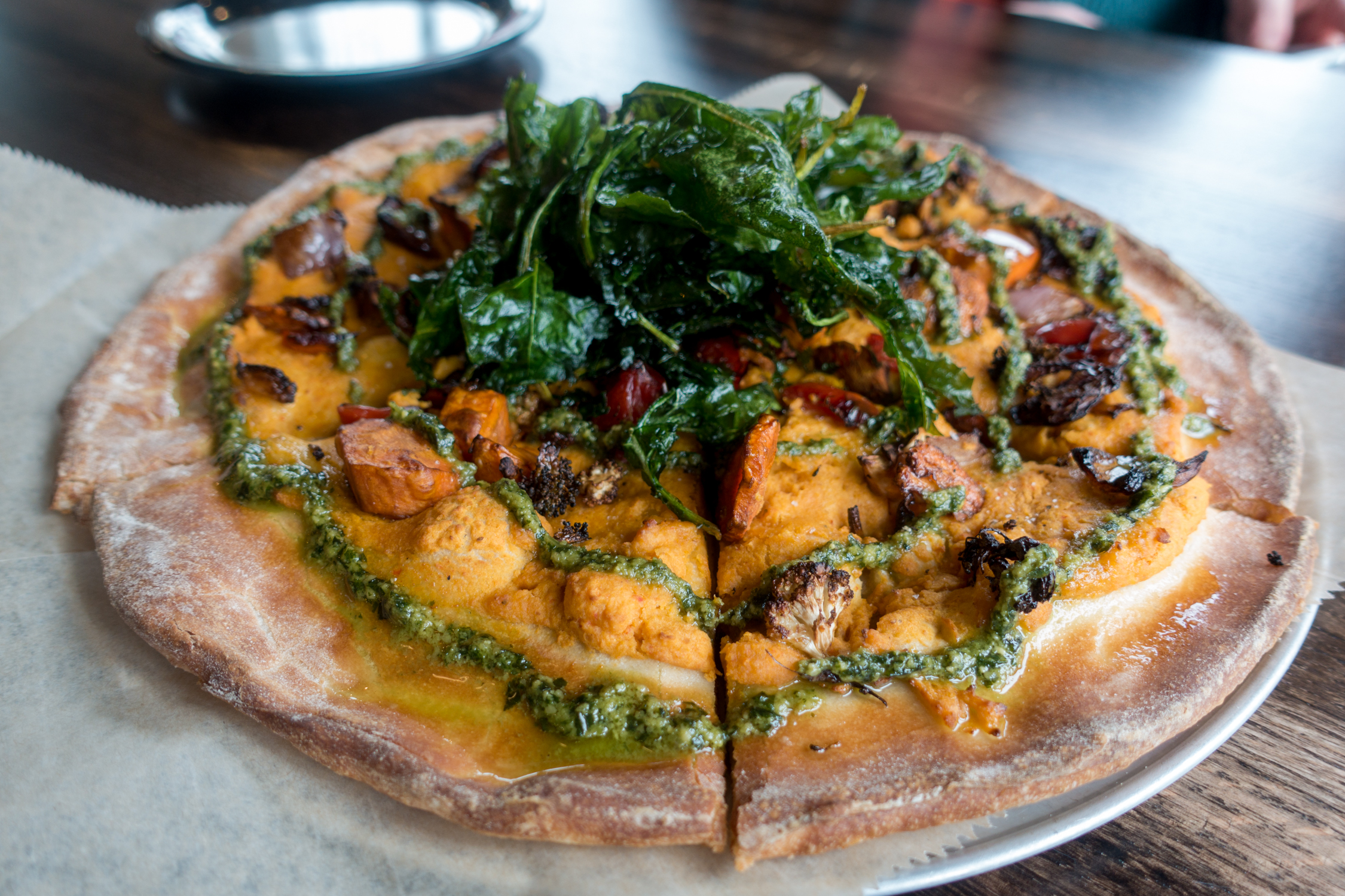 Whether you live in Grand Rapids or our planning a trip to this great Midwest city, I hope that this list of the Best Places for Vegan Pizza In Grand Rapids is helpful in your quest to find delicious vegan pizza! #vegan #travel #pizza #grandrapids