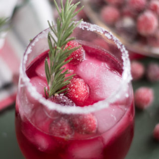 This festive Cranberry Margarita is perfect for your next holiday party! #drink #holiday #Christmas