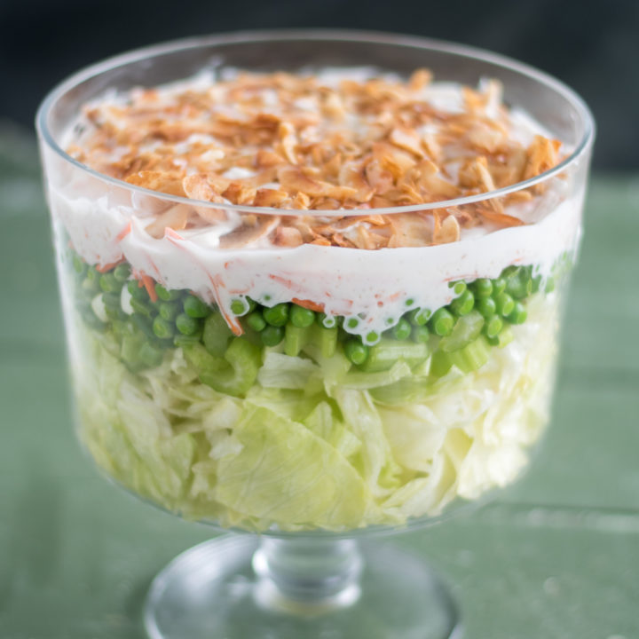 Vegan 7 Layer Salad is an updated version of a traditional Midwest layered salad. It is even better the next day! #Vegan #salad #Christmas #holiday #potluck