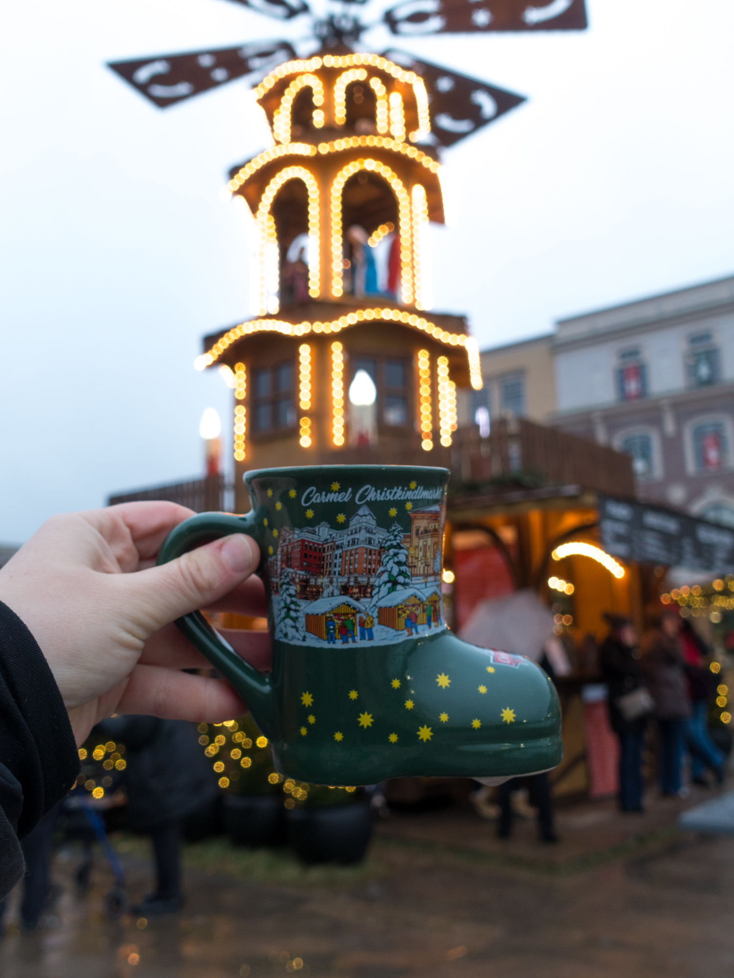 While strolling around the Christmas market, enjoy a mug of Gluhwein—a traditional hot mulled wine. #Christmas #travel #wine #holiday #Indiana