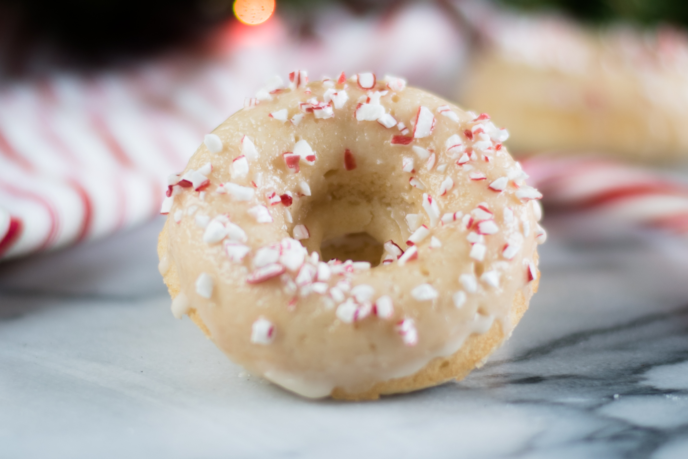 Candy Cane Donuts are the perfect Christmas breakfast treat! #Christmas #breakfast #recipe #vegan #holiday 