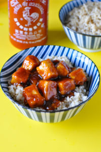 Skip the take-out and make this slightly sweet and spicy Sriracha Tofu at home!