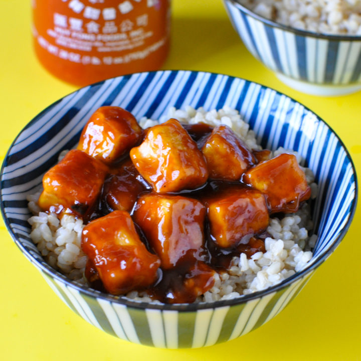 Skip the take-out and make this slightly sweet and spicy Sriracha Tofu at home!