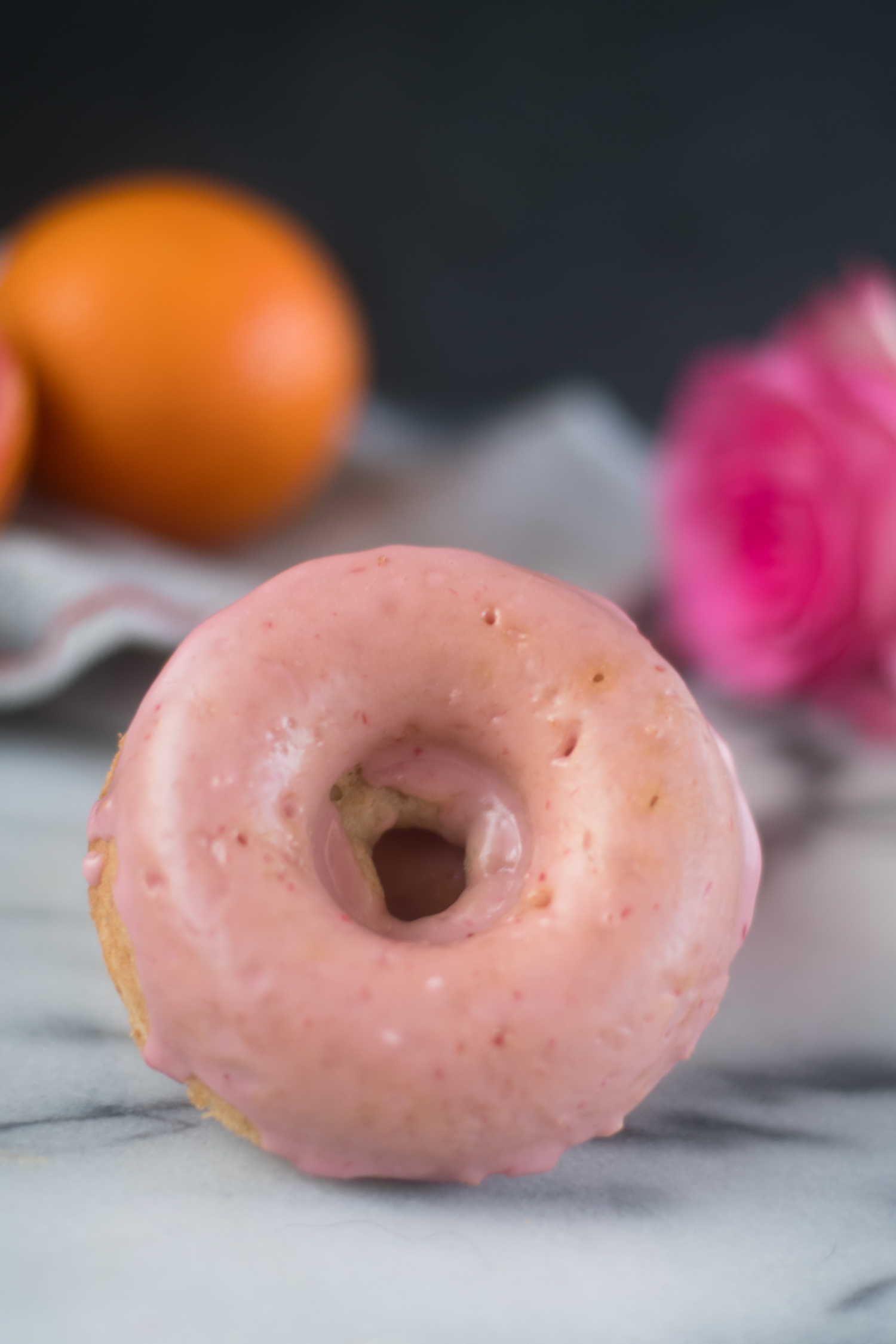 Vegan Blood Orange Donuts topped with a blood orange glaze are perfect for a sweet breakfast treat! #vegan #donuts #recipes #valentines #breakfast