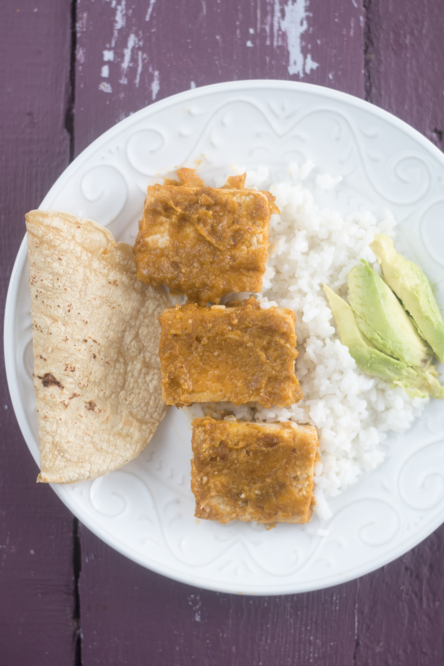 Tomatillo Chipotle Tofu served with rice, tortillas, and rice is a delicious vegan meal! 