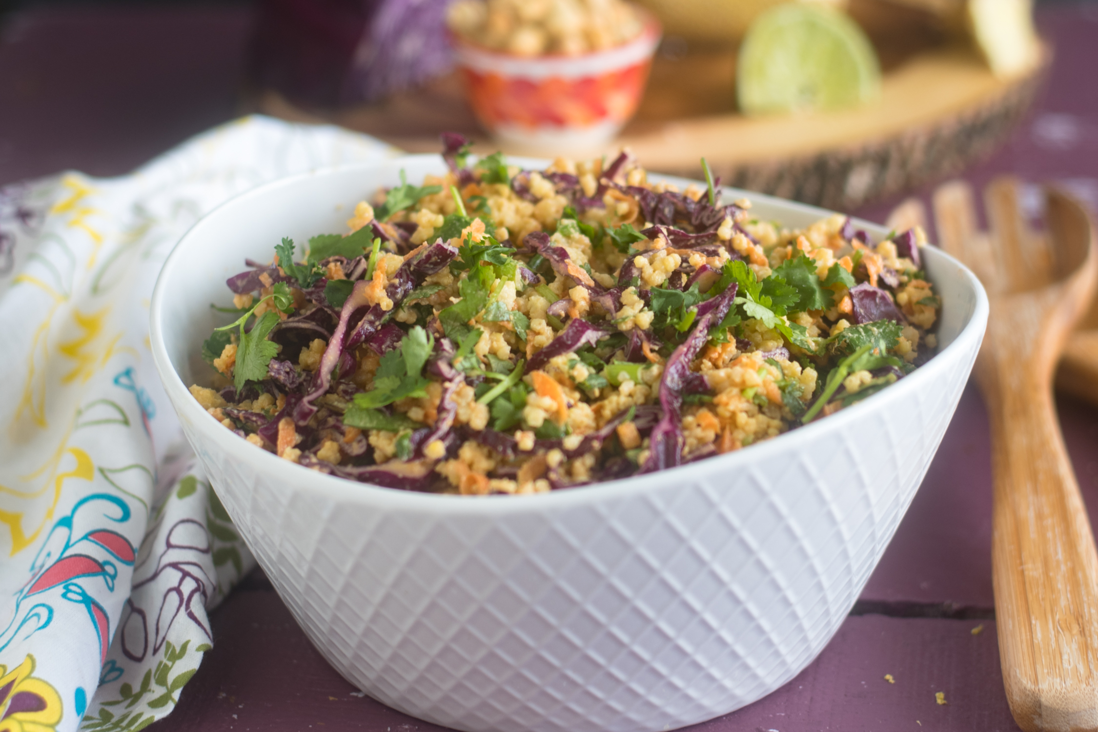 The base of this Vegan Thai Peanut Millet Salad is cooled millet, shredded red cabbage, carrots, green onions, and cilantro. The millet bulks up the salad, adding fiber, B-complex vitamins, as well as several essential amino acids.