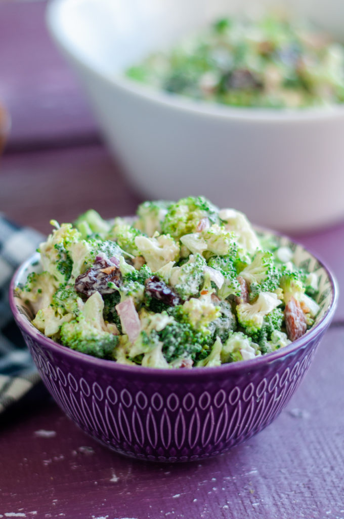 This creamy, savory, crunchy, and delicious Vegan Broccoli Salad with Dried Cherries and Almonds is the perfect potluck dish! #salad #recipe #healthy #dairyfree #glutenfree #veganrecipes #potluck #entertaining #partyfood #broccoli 
