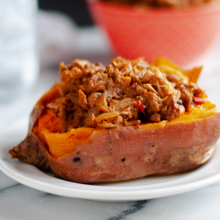 This Slow Cooker BBQ Peach Jackfruit is an easy recipe that has the perfect balance of sweet, tart, and spicy. #vegan #recipe #vegetarian #slowcooker #peach #BBQ