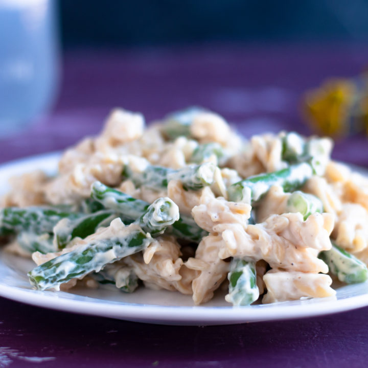 This rich creamy green bean pasta takes less than 30 minutes to cook! Perfect for when you’re craving something a little more decedent for dinner. It's dairy-free too! #vegan #pasta #recipe #dinner #dairyfree #veganrecipes #glutenfree #greenbean