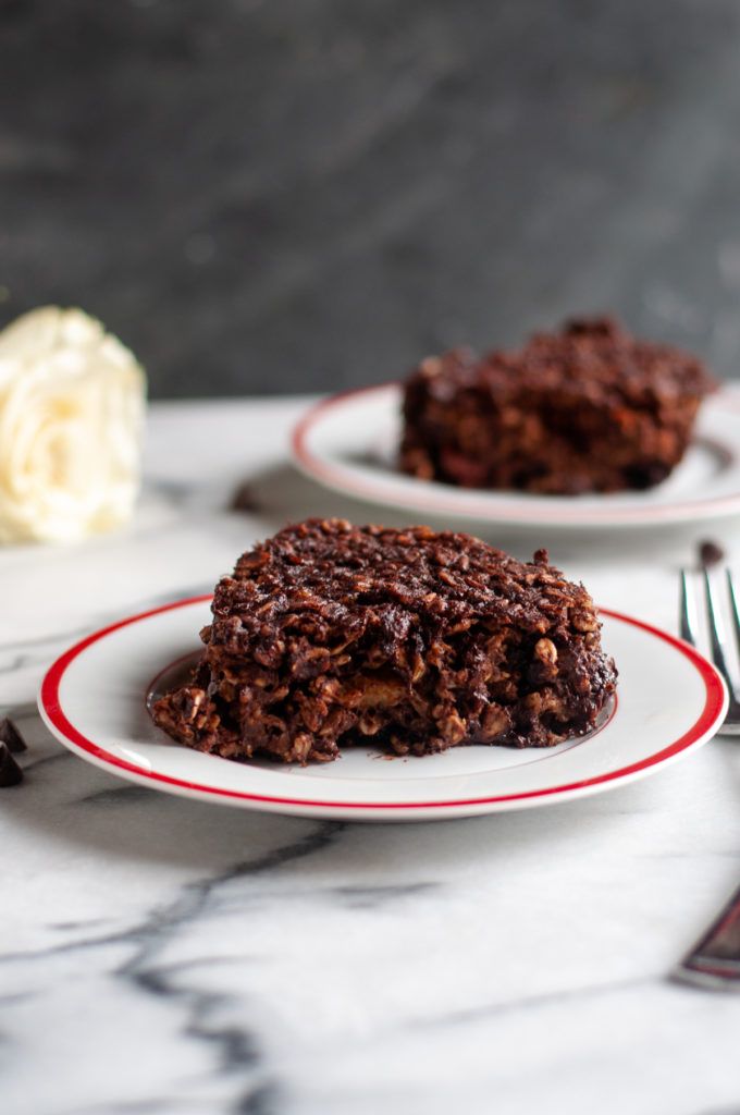 Chocolate for breakfast might sound too decedent, but this Baked Chocolate Cherry Oatmeal is loaded with healthy ingredients!  #vegan #Oatmeal #mealprep #chocolate #breakfast