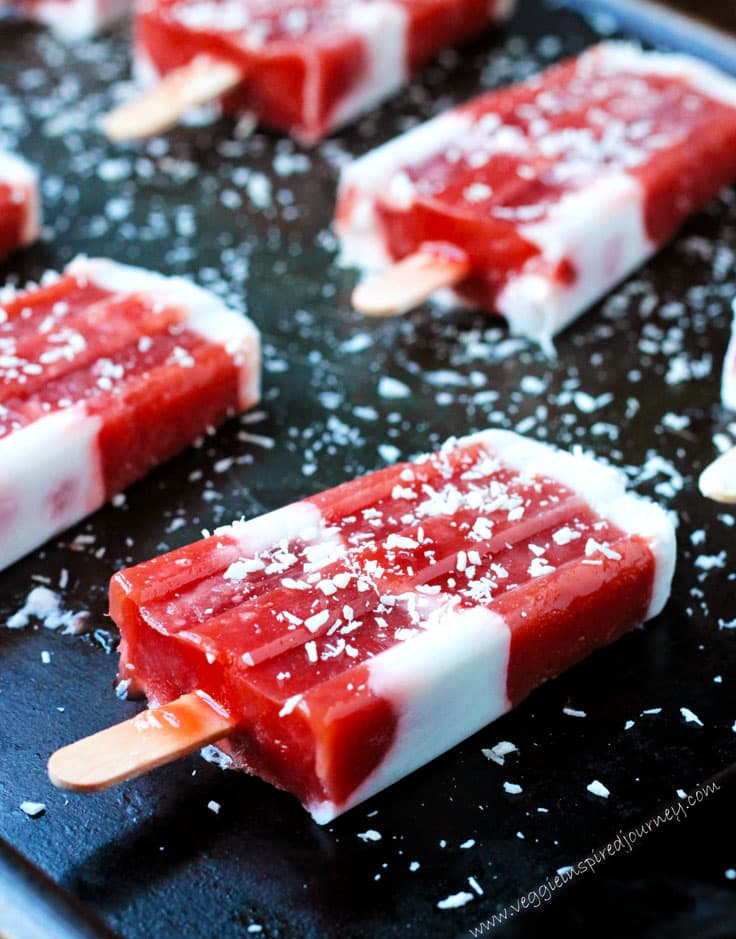 Strawberry Rhubarb Coconut Milk Popsicles – sweet, tart, creamy, and refreshing – these dairy free frozen treats will keep you cool all summer.