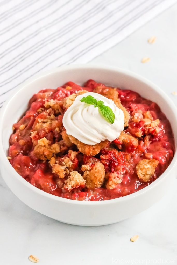 Strawberry Rhubarb Crisp brings the combo of tart rhubarb and sweet strawberries into a delicious vegan dessert with a gluten-free crumble topping.