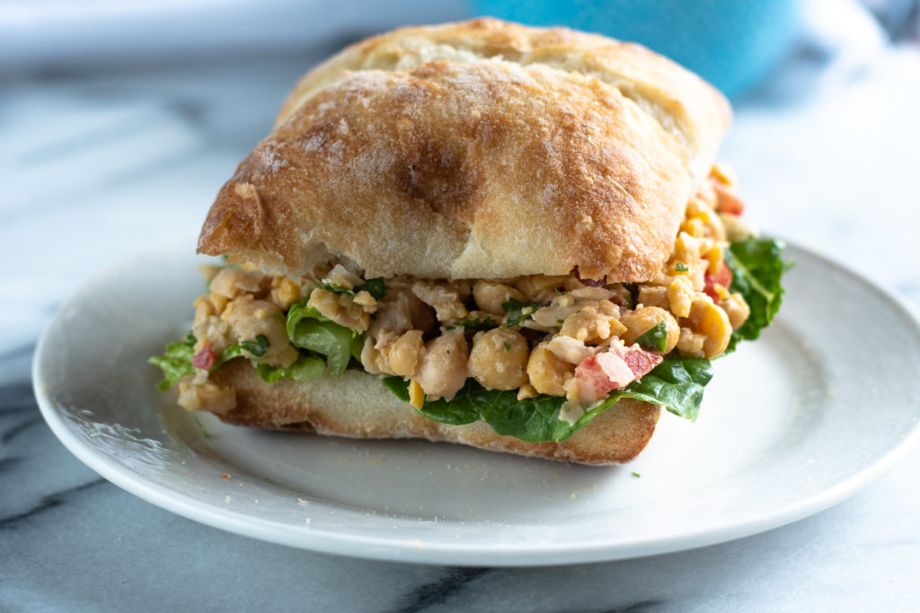 The chickpea salad is inspired by a classic Mexican tuna salad. Instead of using tuna, chickpeas are smashed to created the texture of tuna. Perfect for a quick and easy lunch! #lunch #recipes #food #Mexican #vegan #VeganMexican #easyrecipes #sandwich #chickpea