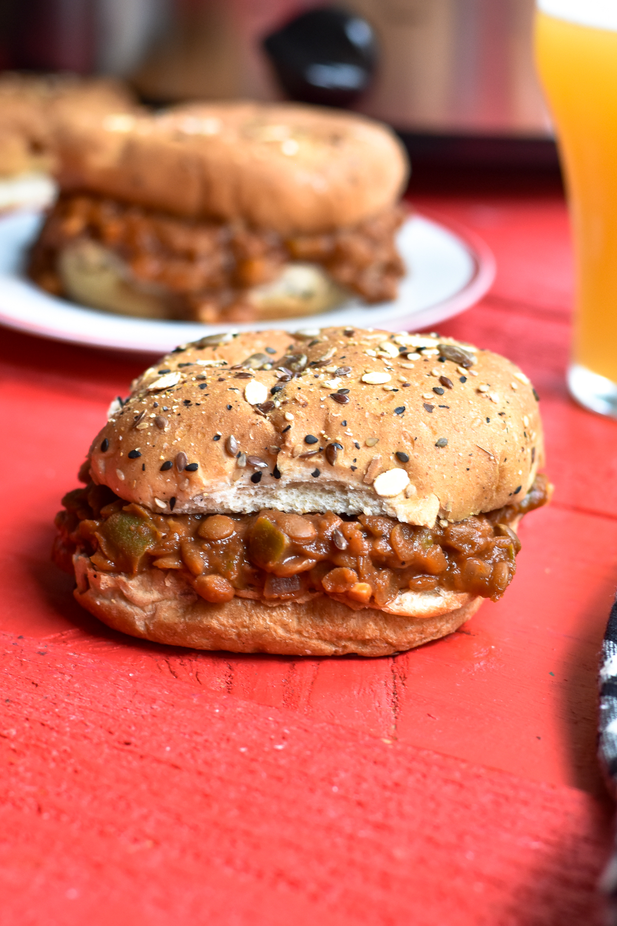 This recipe for Lentil Sloppy Joes couldn't be easier to make. The slow cooker does all the work for you, making this recipe perfect for an easy dinner. This plant-based spin on the classic sloppy joe is a crowd pleaser that won't break the bank! #vegan #vegetarian #sloppyjoes #Lentils #slowcooker #crockpot