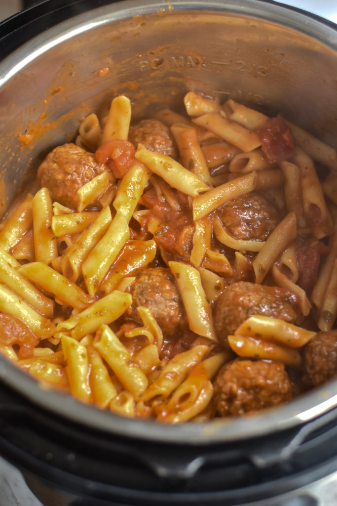 Dinner just got easier with this recipe for Instant Pot Frozen Meatballs with Pasta. Simply add all the ingredients to the Instant Pot and let it do its thing!