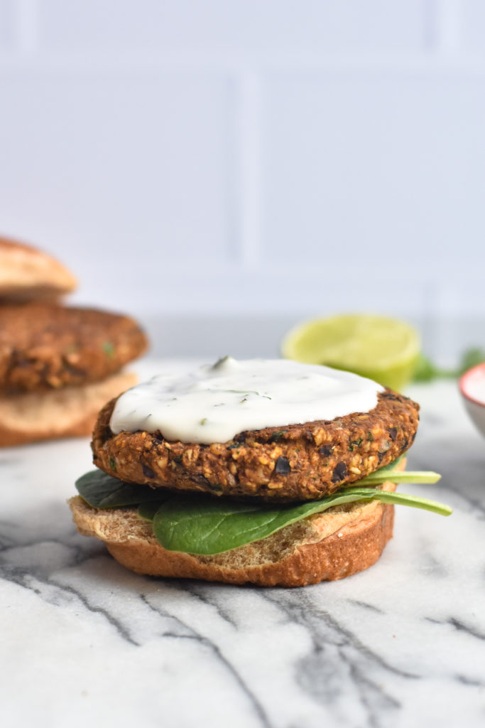 Delicious easy black bean burgers topped with a cilantro sauce. 