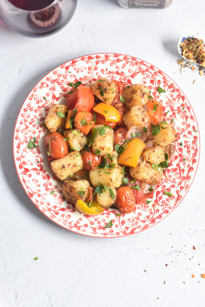 Sheet Pan Cauliflower Gnocchi and Roasted Vegetables is perfect for anyone who loves shopping at Trader Joe's.  #recipe #vegan #traderjoes #easyrecipe 