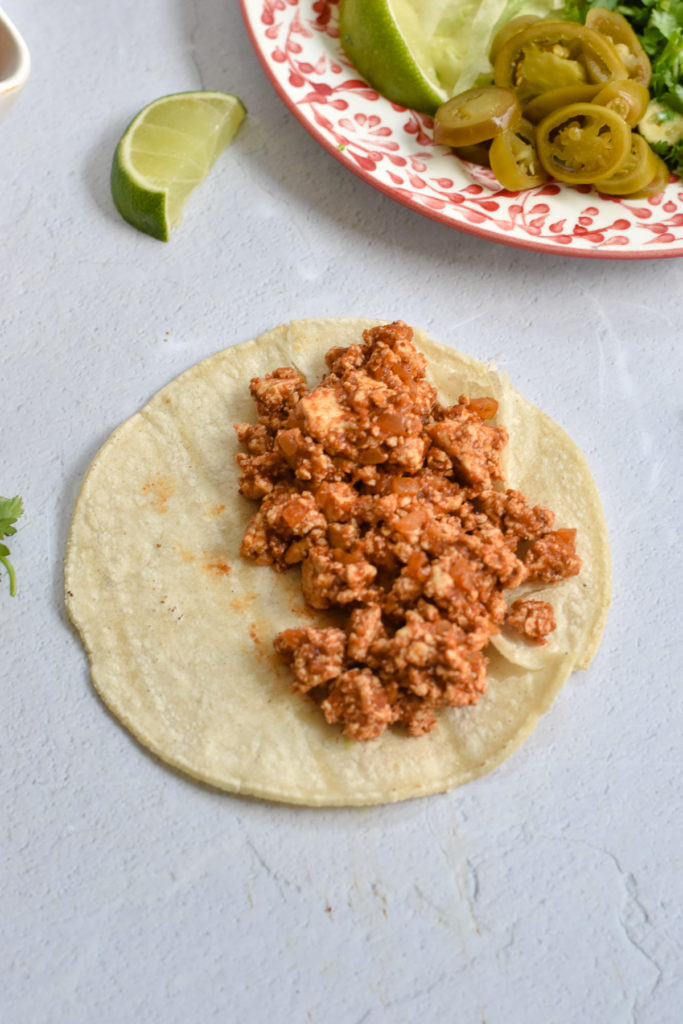 Looking for a new taco recipe for taco night? These Easy Tofu Tacos are perfect if you're looking for an easy meatless taco recipe. 